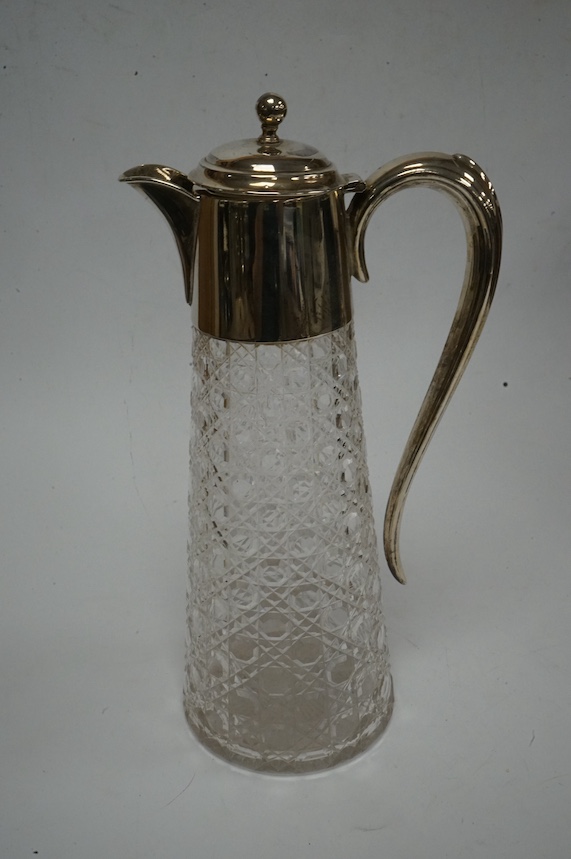 A George V silver mounted cut glass claret jug, Birmingham, 1911, height 25.3cm, Condition - poor to fair